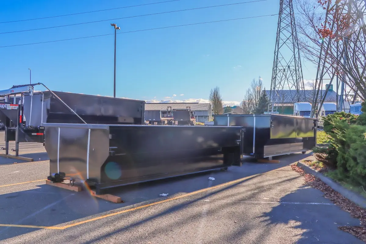 Roll-off dumpster ready for waste disposal at job site for Commercial Dumpster Rental in Olympia